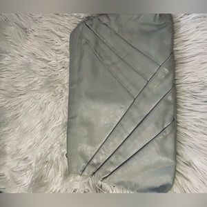 Clutch purse handbag in gray.